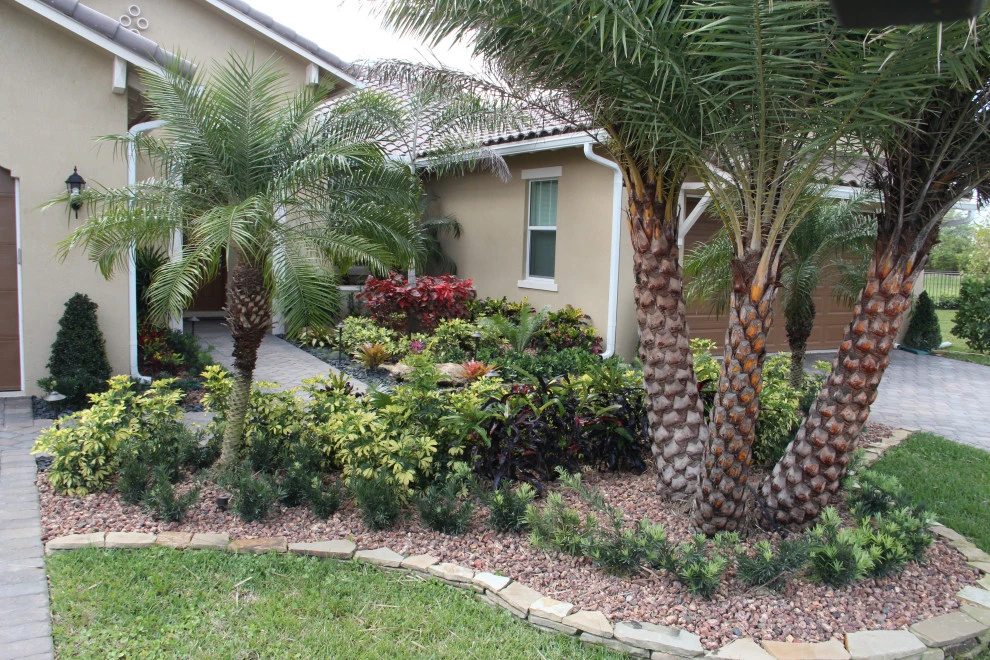 Stone Landscape Rock Border Walls by Broward Landscape, Inc. - Photo 23