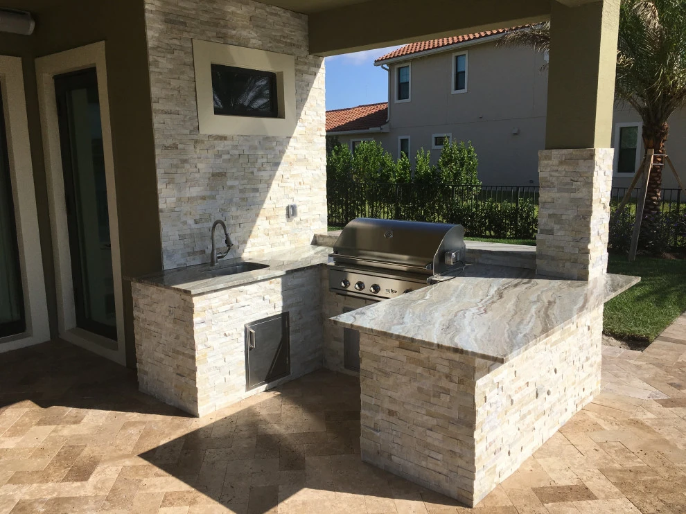 Outdoor Kitchen with Ledge Stone by Broward Landscape, Inc. - Photo 16