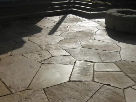 stone slab outdoor seating area by Sergio Garcia Marble And Tile, Inc. - Photo 2