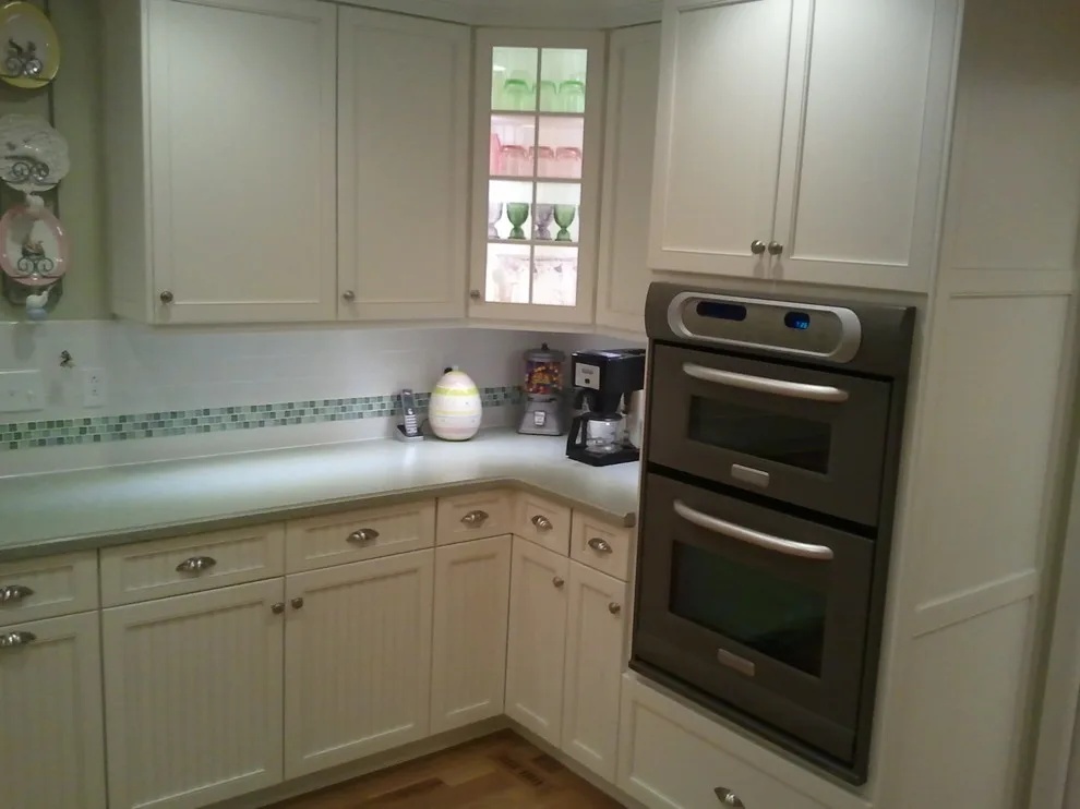 Aqua Corian with White Cabinets by Dimensions In Wood Inc - Photo 5