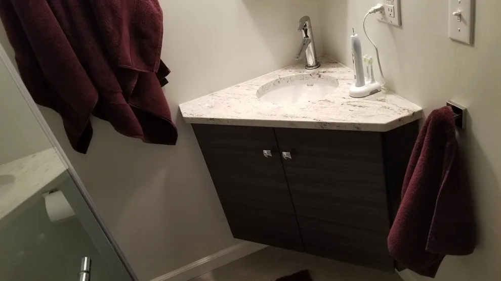Compact contemporary restroom by Jamie Tamanaha With Florcraft Carpet One - Photo 8