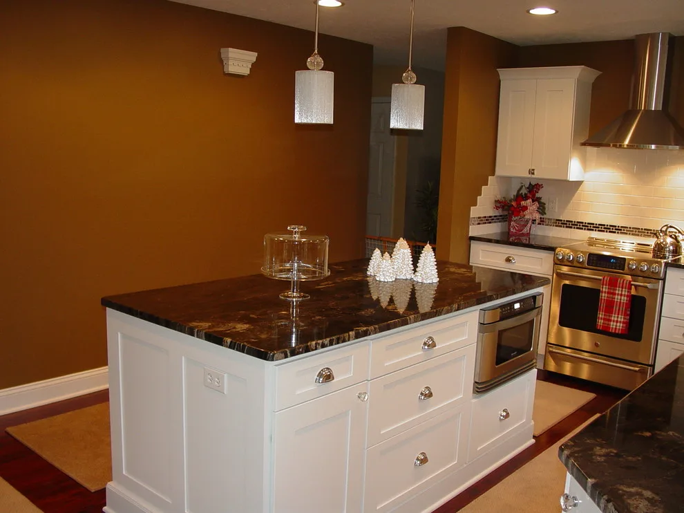 Elegant Kitchen Renovation by Solon White by Kitchen And Bath Etc. - Photo 2