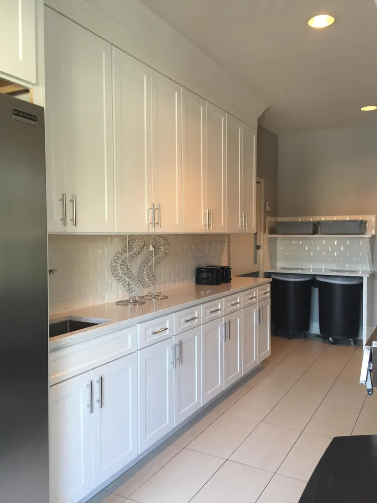 Light-Colored Kitchen Cabinets by Timberland Building Solutions - Photo 3