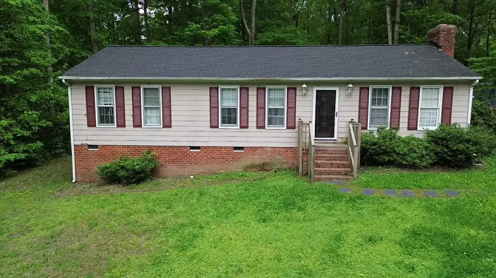 Exterior renovation - siding, window, and gutter replacement by Hammer & Nail Home Improvement, LLC - Photo 5