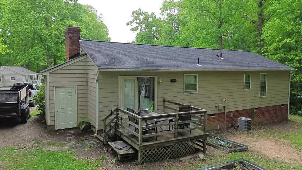 Exterior renovation - siding, window, and gutter replacement by Hammer & Nail Home Improvement, LLC - Photo 10