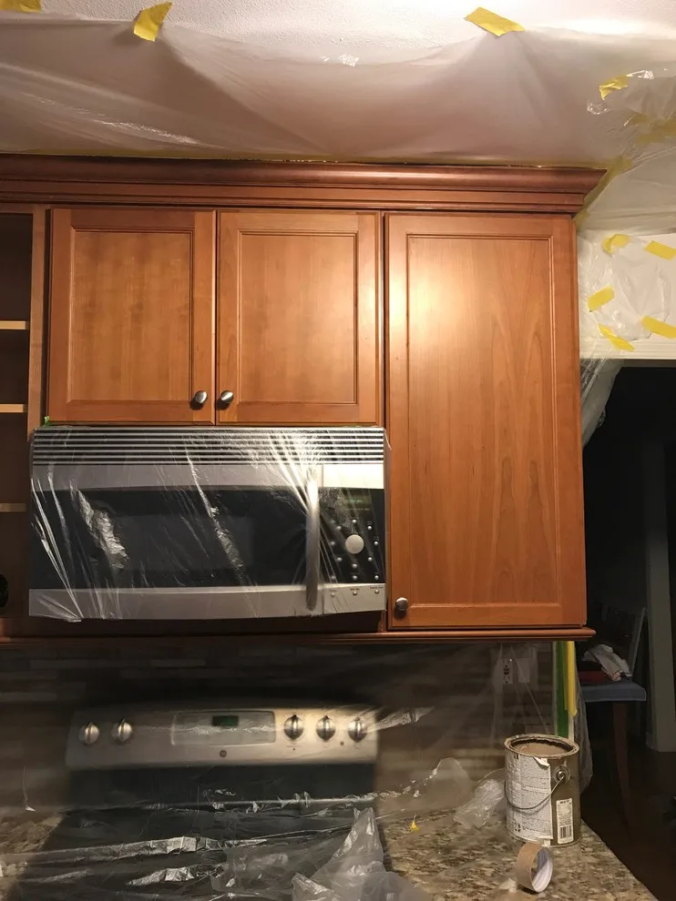 Kitchen Cabinet Transformation: Before and After by CertaPro Painters Of Princeton - Photo 6