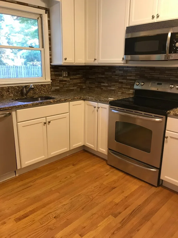 Kitchen Cabinet Transformation: Before and After by CertaPro Painters Of Princeton - Photo 4