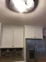 Kitchen Cabinet Transformation: Before and After by CertaPro Painters Of Princeton - Photo 13