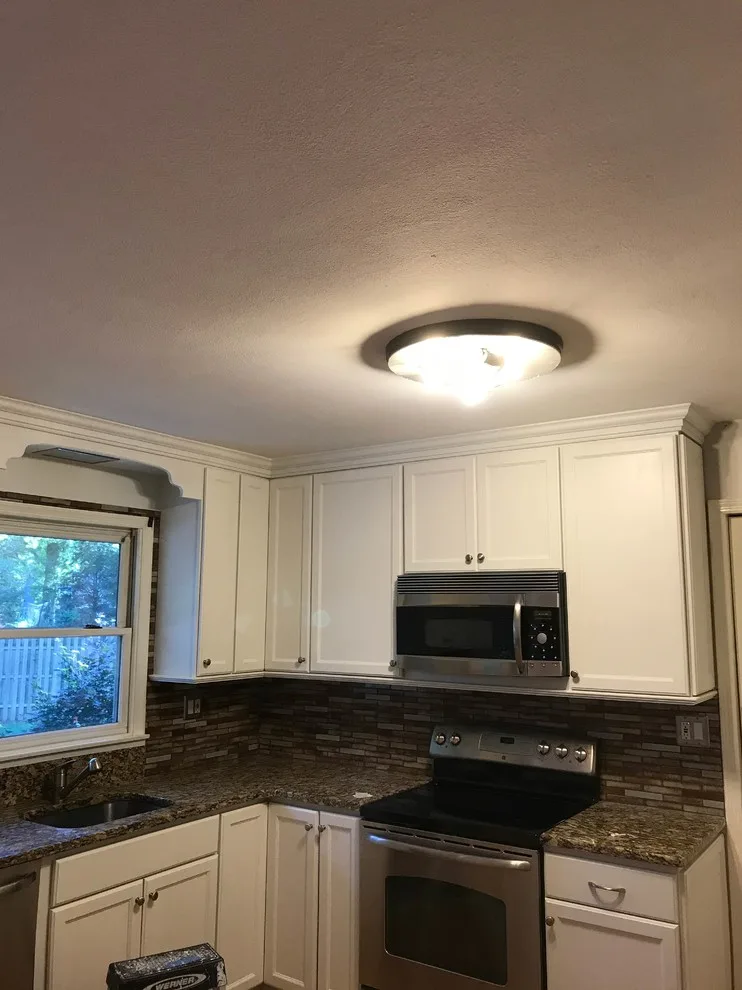Kitchen Cabinet Transformation: Before and After by CertaPro Painters Of Princeton - Photo 3