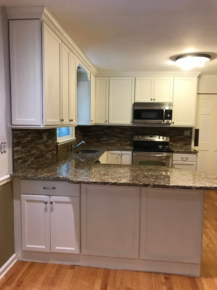 Kitchen Cabinet Transformation: Before and After by CertaPro Painters Of Princeton - Photo 11