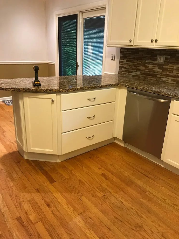 Kitchen Cabinet Transformation: Before and After by CertaPro Painters Of Princeton - Photo 16