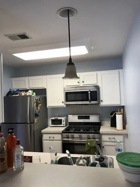 CUPBOARD STORAGE by CertaPro Painters Of Princeton - Photo 51