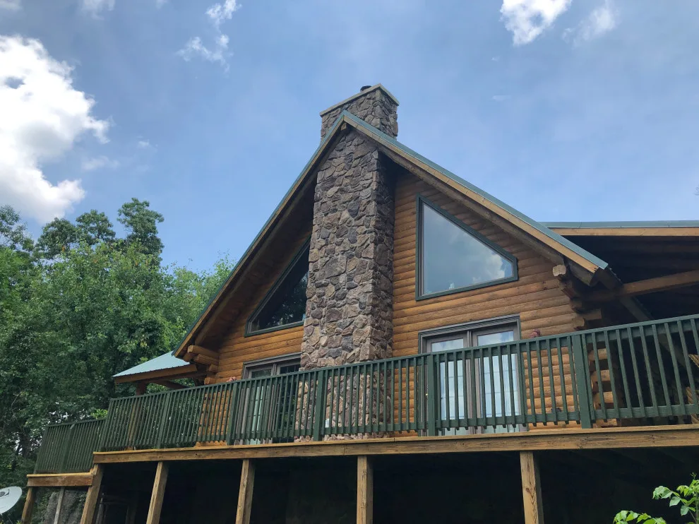 Log Cabin Transformation by Hawk Painters - Photo 5