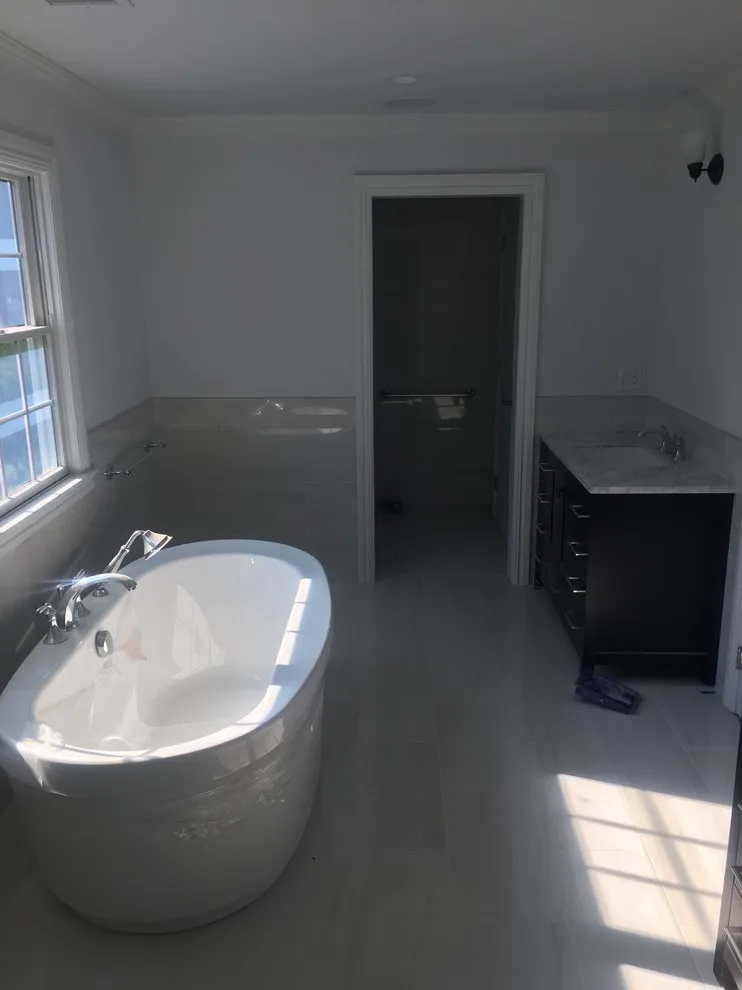 Spa-Like Master Bathroom with Freestanding Tub by Bill Johnson Painting - Photo 3