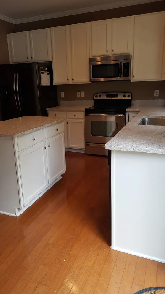 White Painted Oak Cabinets and Island by Wallscapers Kitchen & Bath Innovations - Photo 5