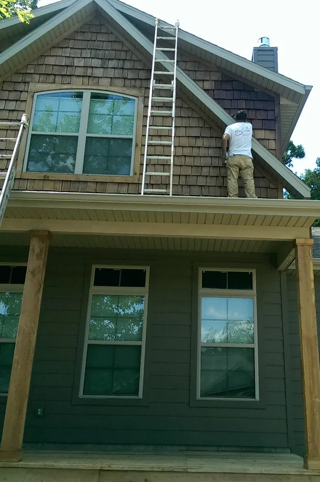 A Fayetteville cedar home by 360 Painting Of NWA - Photo 2