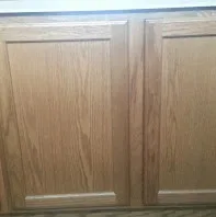 Distressed kitchen cabinets with a painted finish by ValHolla LLC - Photo 4