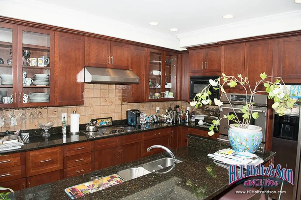 Transformed White High Gloss Kitchen Cabinets - Before and After by H.J. Holtz And Son, Inc. - Photo 3