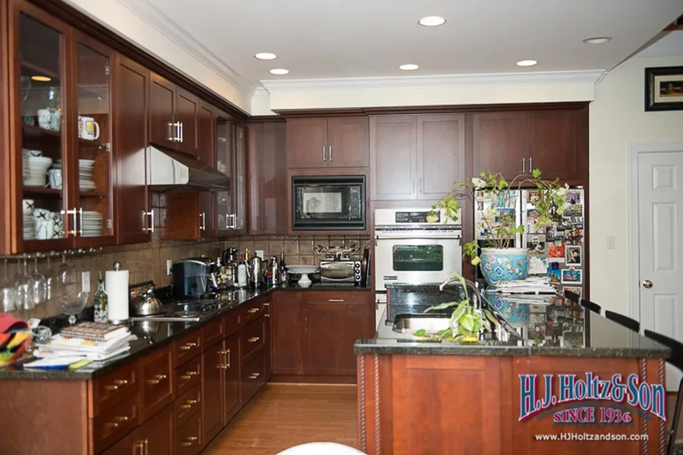 Transformed White High Gloss Kitchen Cabinets - Before and After by H.J. Holtz And Son, Inc. - Photo 2