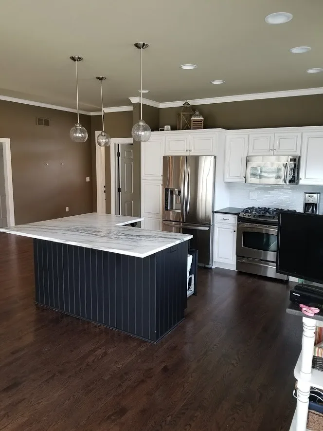 Colored kitchen island by Hometerior Finishing, LLC. - Photo 2
