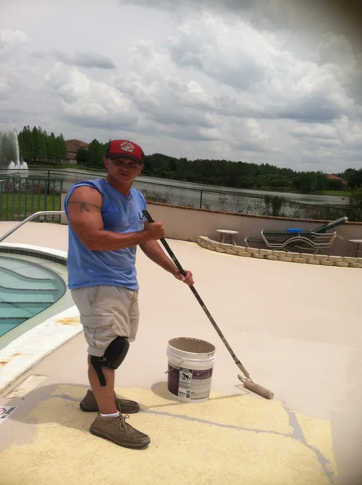 Deck painting for the pool by American Veterans Painting, LLC - Photo 4