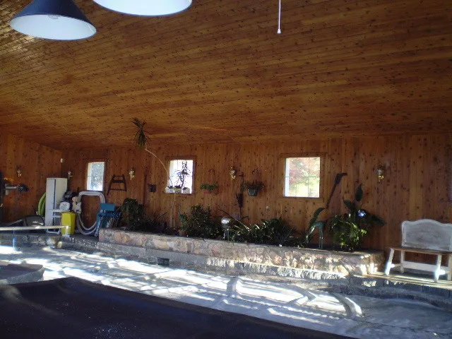 Refinishing Wood Siding for Pool House by Painting By Marge Inc. - Photo 2