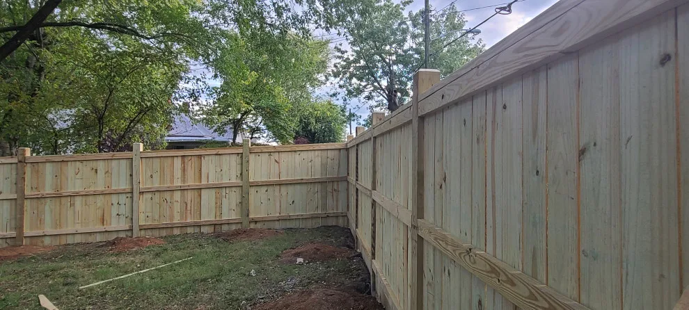Wood Fence Replacement Project by Pro-Master Painting - Photo 4
