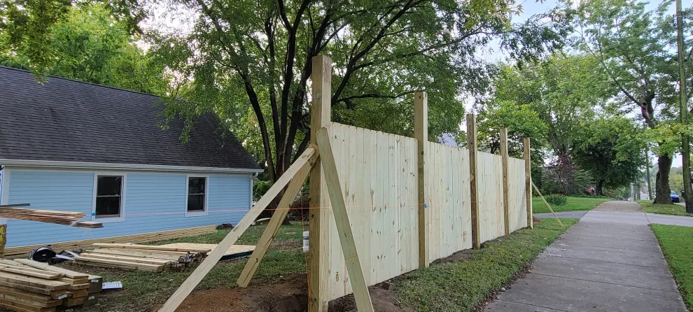 Wood Fence Replacement Project by Pro-Master Painting - Photo 10
