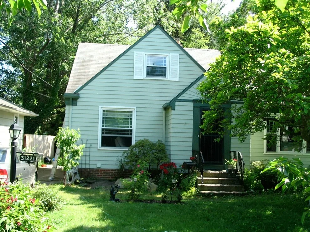 Cape Cod Exterior Revitalized by Textbook Painting - Photo 2