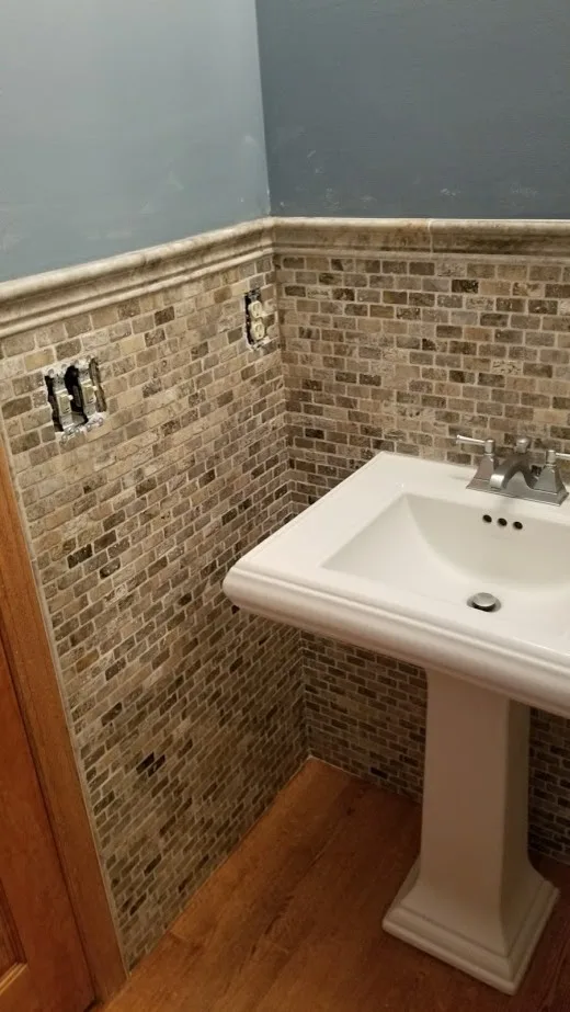 Travertine Backsplash for the Powder Room by Hometerior Finishing, LLC. - Photo 2