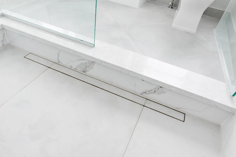 Radiant and Luminous Marble Bathroom Renovation by Labra Design Build - Photo 9