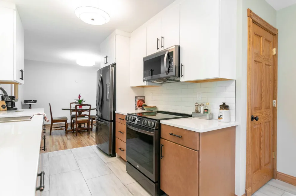 Extended Lake Culinary Space by Pinnacle Design & Remodeling - Photo 12