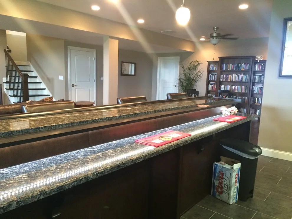 Upper Level Master Suite with Basement Bar by Bucher Construction - Photo 19