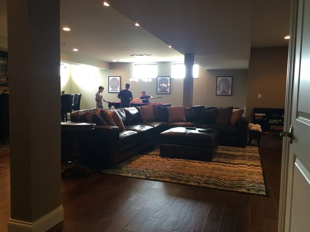 Upper Level Master Suite with Basement Bar by Bucher Construction - Photo 35
