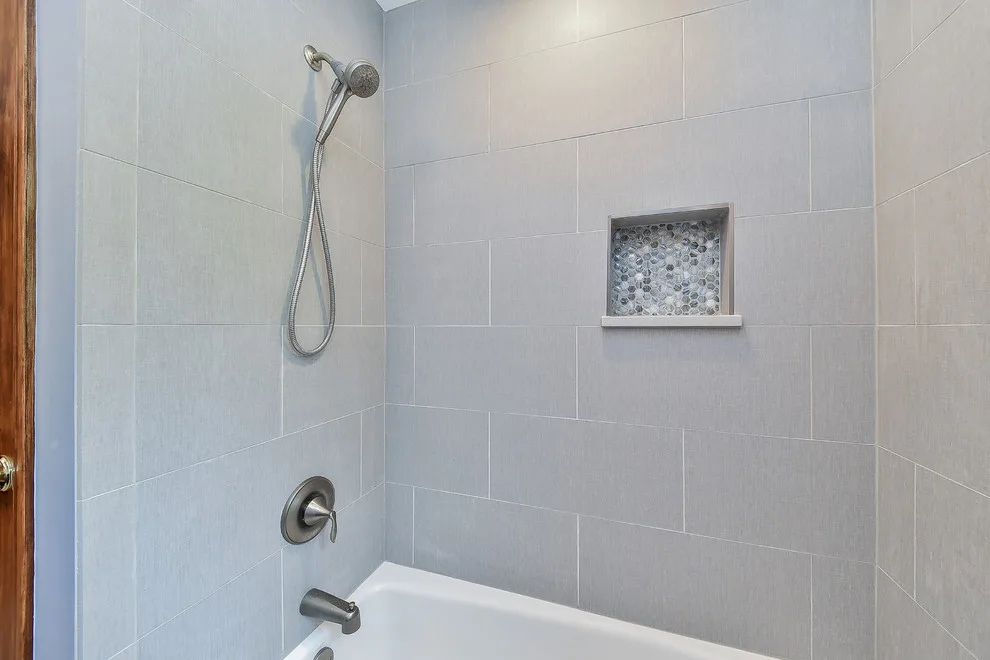 Master and Hall Bathroom Renovations by Sebring Design Build - Photo 12