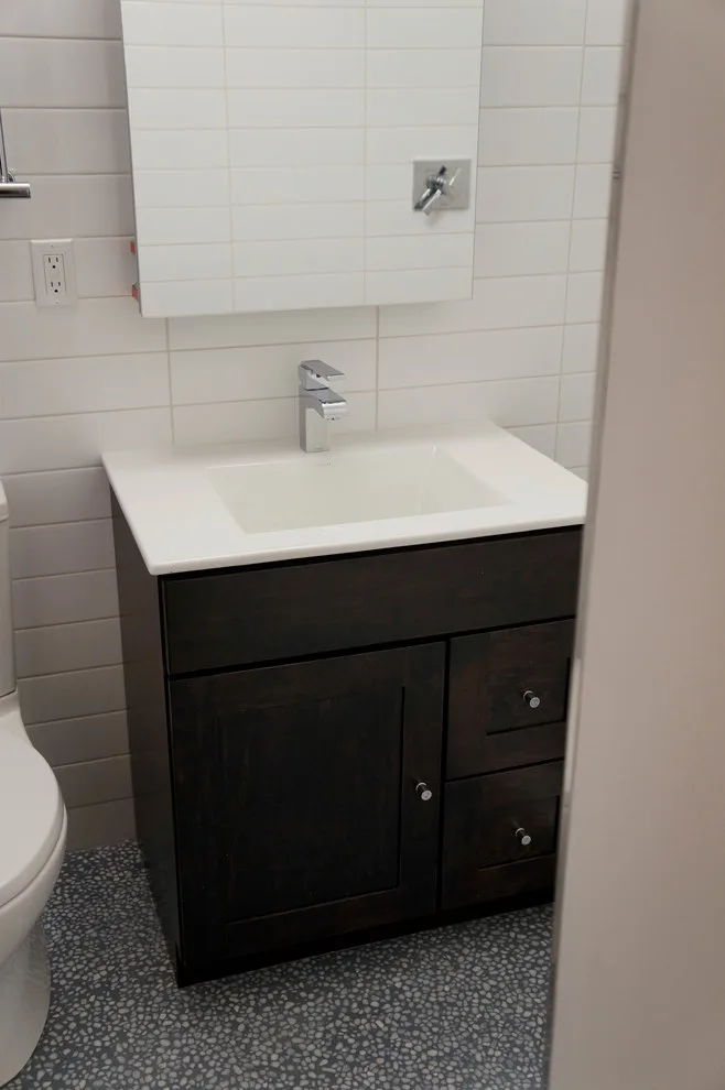 restroom makeover by Concrete Robot Design And Build LLC - Photo 13