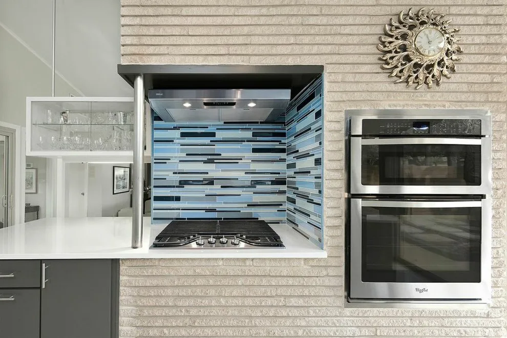 Forest Oaks Midcentury Modern Kitchen by Virtuoso Builders - Photo 11