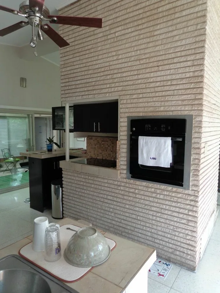 Forest Oaks Midcentury Modern Kitchen by Virtuoso Builders - Photo 13