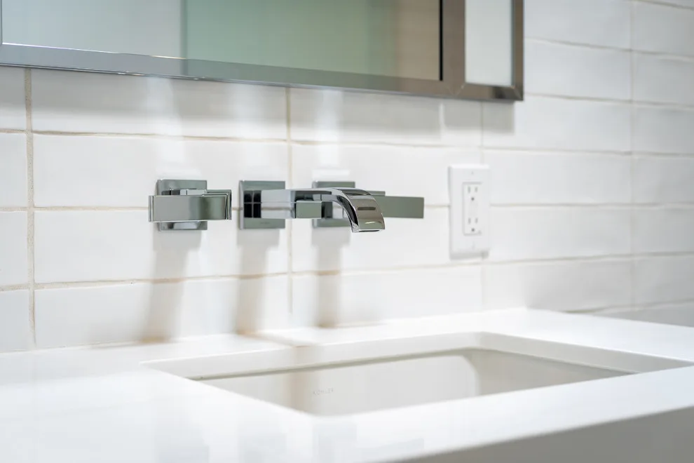 Sleek White Bathrooms by JRP Design & Remodel - Photo 7