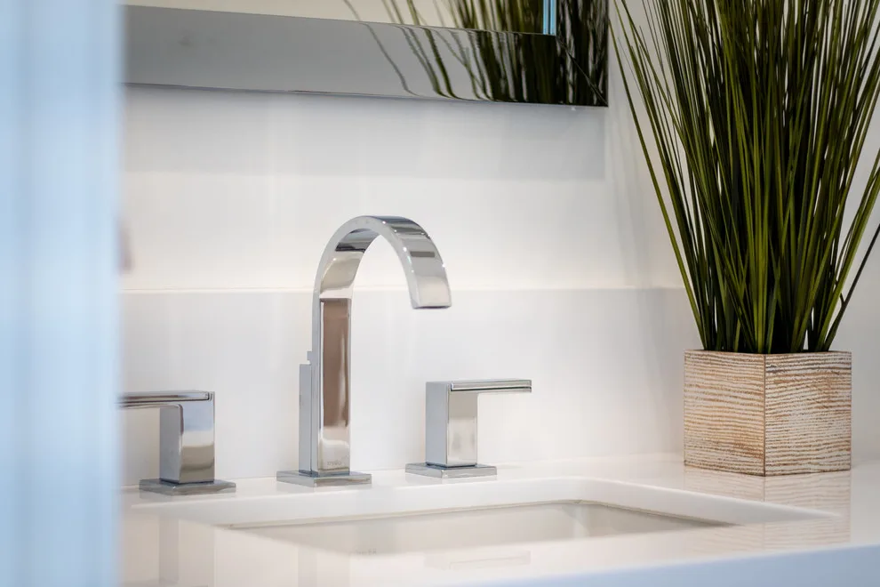 Sleek White Bathrooms by JRP Design & Remodel - Photo 9