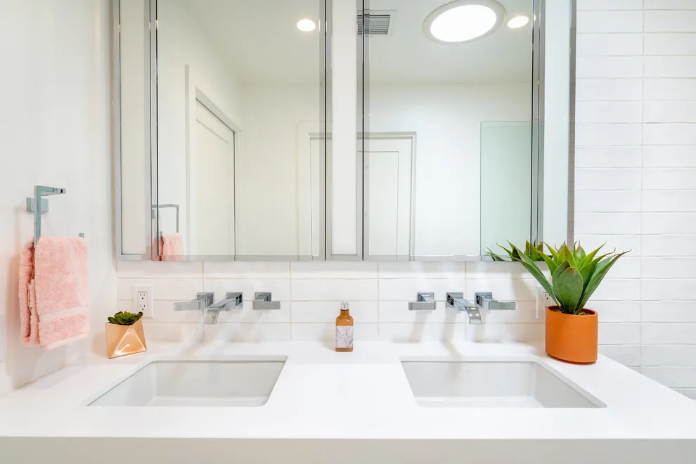 Sleek White Bathrooms by JRP Design & Remodel - Photo 2