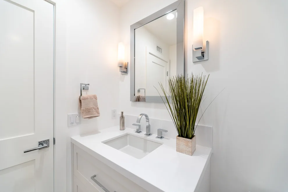 Sleek White Bathrooms by JRP Design & Remodel - Photo 4