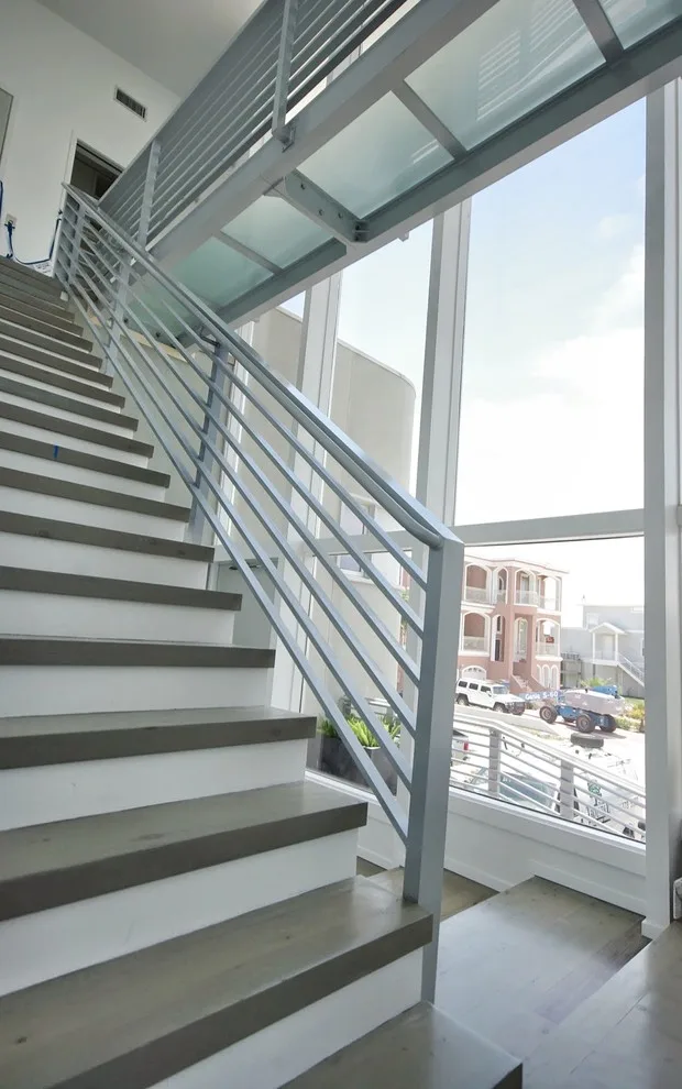 Contemporary Coastal Home Renovation by Highpointe DBR - Photo 2