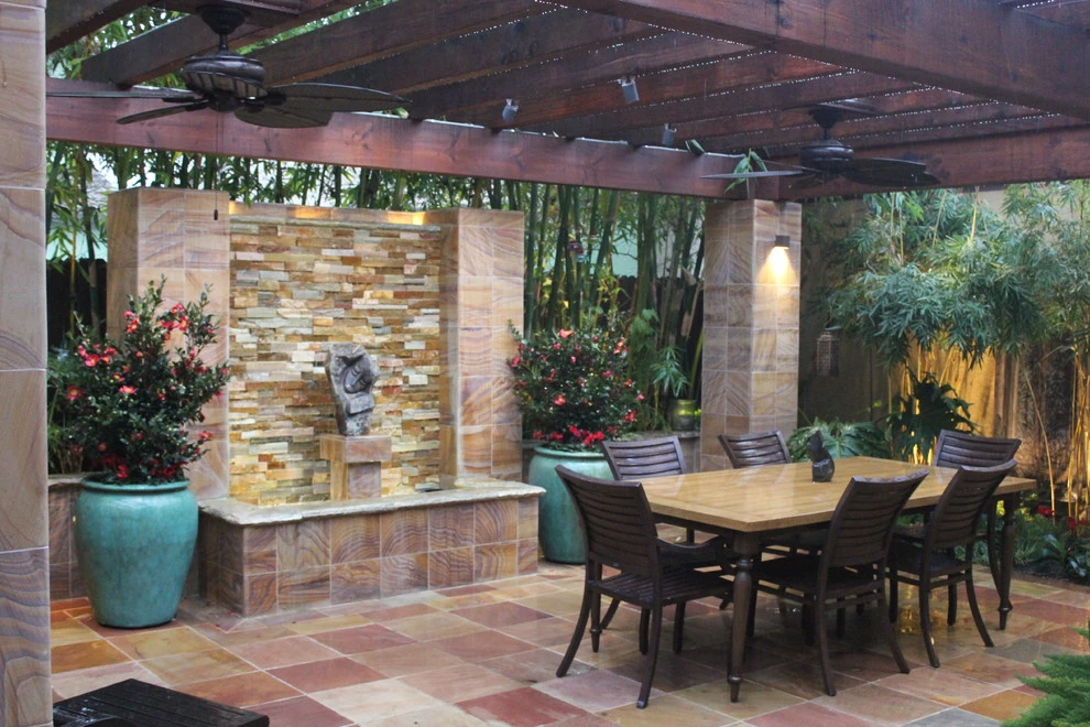Exotic outdoor dining room by Michael Glassman & Associates - Photo 8