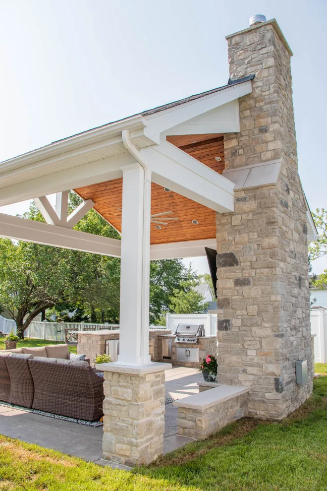 Gabled Pool House Featuring a Fireplace and Grilling Space by Heartlands Building Company - Photo 12