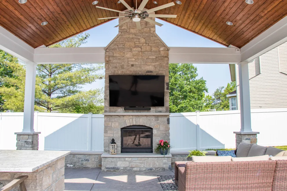 Gabled Pool House Featuring a Fireplace and Grilling Space by Heartlands Building Company - Photo 7