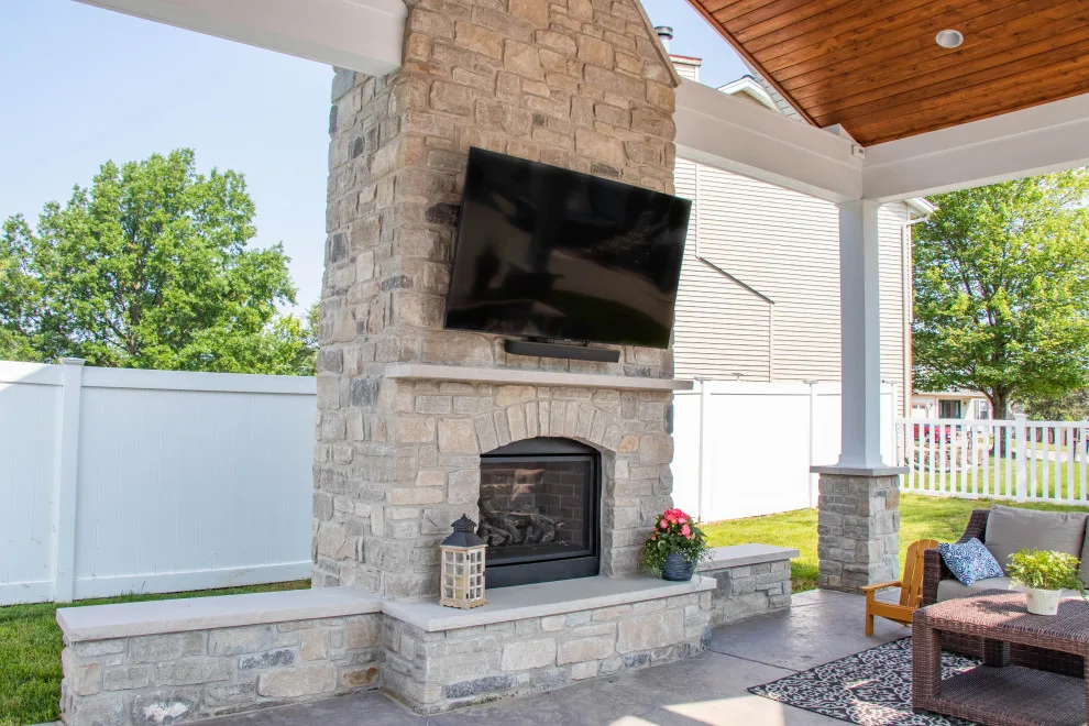 Gabled Pool House Featuring a Fireplace and Grilling Space by Heartlands Building Company - Photo 16