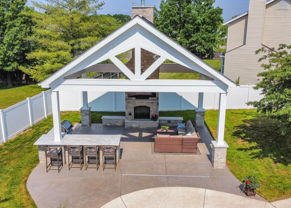 Gabled Pool House Featuring a Fireplace and Grilling Space by Heartlands Building Company - Photo 21