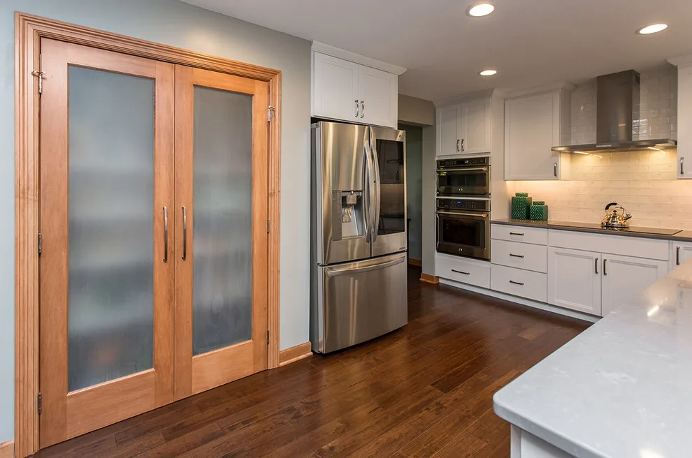 Revamped Blue and White Kitchen by Red House Remodeling - Photo 2