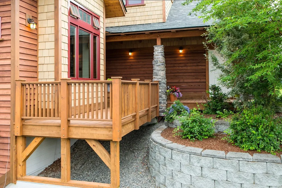 Charming Entryway, Pathway, and Rear Decks Featuring Trex Decking and Cedar Railings by Treeline Construction - Photo 17